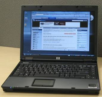 Windows7 HP Compaq 14 1 /2GB/core duo 2 1 GHz Laptop Notebook