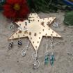 Ohrschmuck dekorartiv präsentieren z. B. auf einem Stern