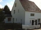 Wohnung mit Garten Stellplatz und Garage zu verkaufen