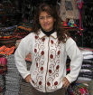 Weiße Strickjacke mit gestickten Rosenranken Alpakawolle